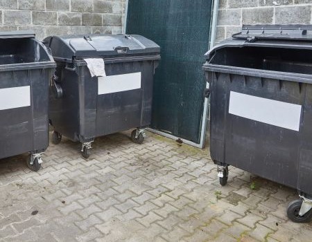 Dirty dumpster pad needing sanitization